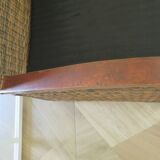 2 colonial-style armchairs in woven rattan and exotic wood