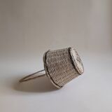 Round wicker basket in light wood