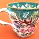 Antique porcelain cup in the Minton style with Japanese decoration.