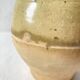 Old small goat-shaped jug in ochre glazed stoneware.