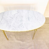 Oval coffee table in marble and brass