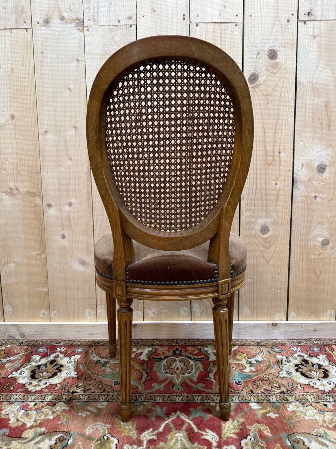 Set of 6 Louis XVI medallion chairs in wood and caning.