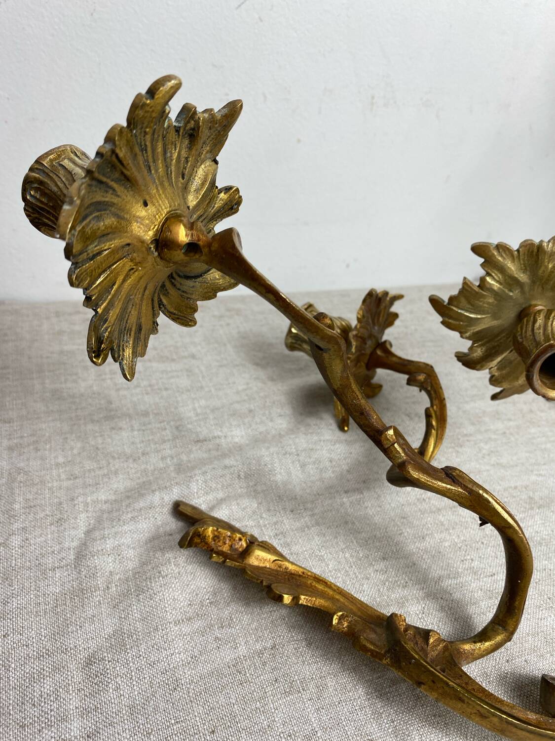 Two Louis XV style bronze wall candlesticks