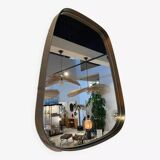 Rearview mirror and free-form brushed metal contour