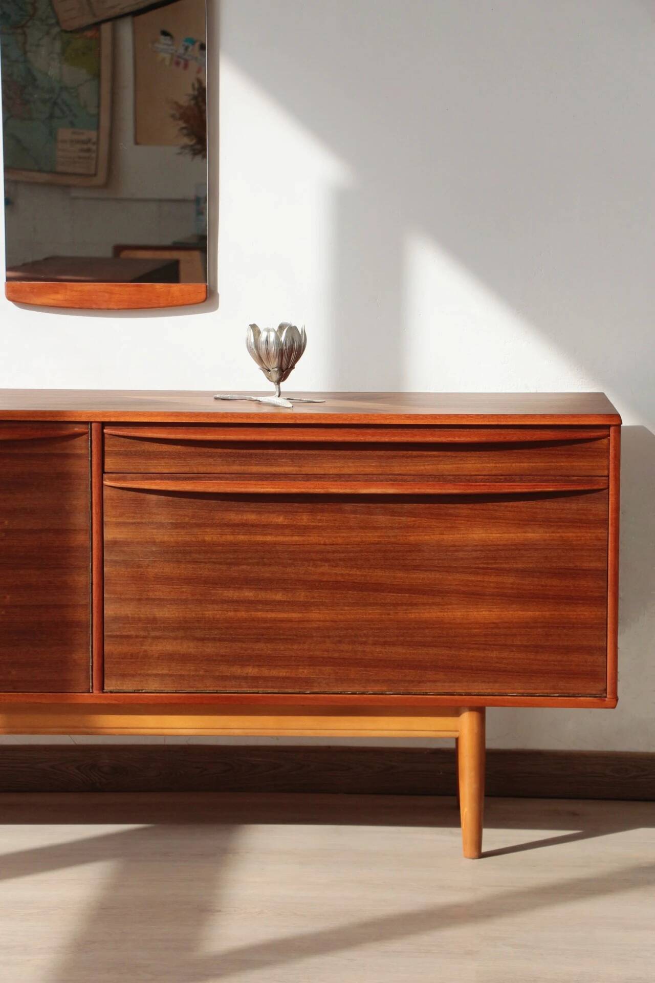 Vintage zebrano and walnut furniture from Morris of Glasgow.
