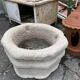 Ancient stone holy water font