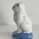 Small ancient glazed ceramic cat from the 19th century.