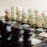 Vintage Marble Chess Set in Black and Cream Stone with Hand-Carved Pieces, Italian 1960s