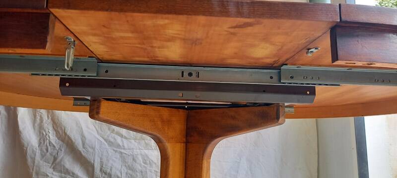 Vintage round extendable wooden table.