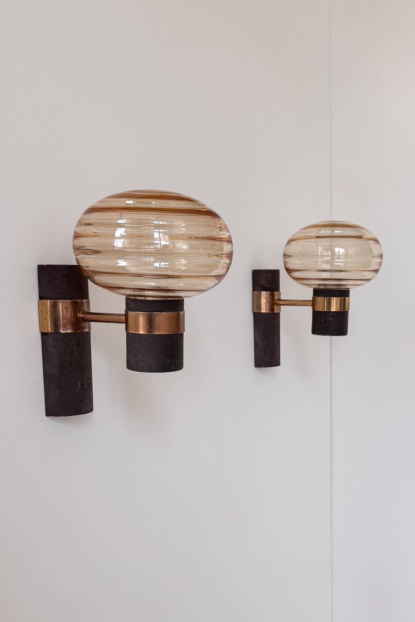 Pair of vintage wall lights, brass and amber glass, France, 1970.