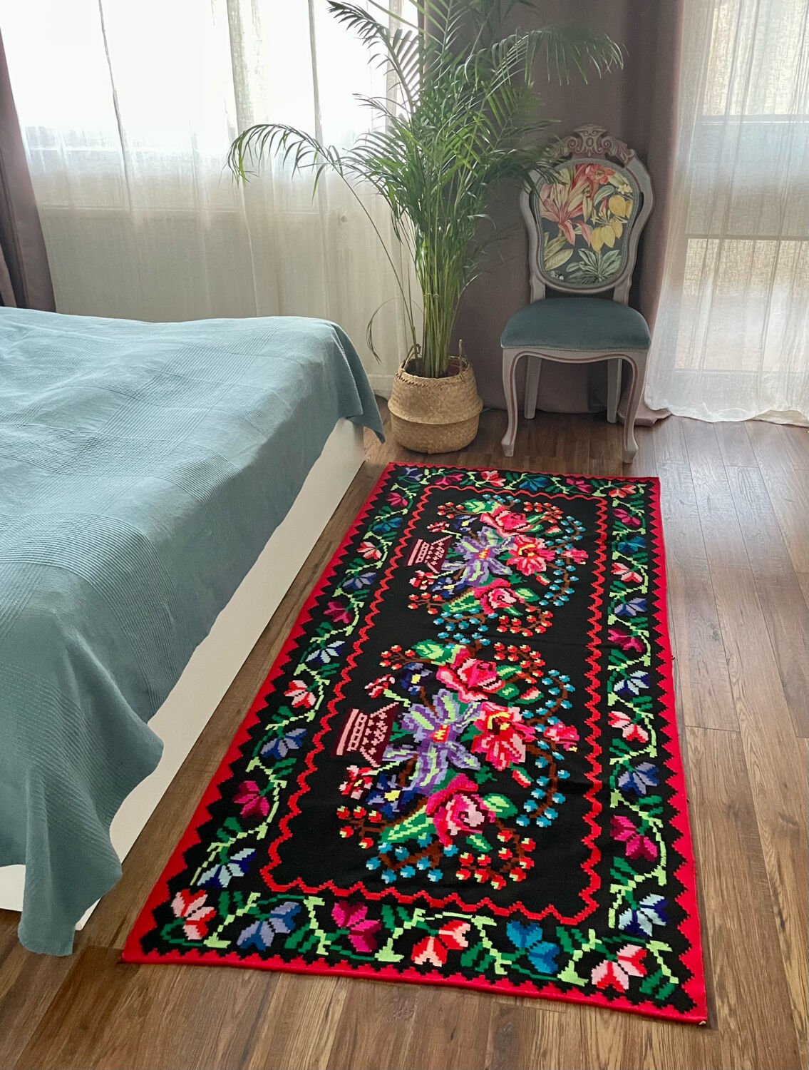 Vintage Romanian handwoven carpet with floral colorful design