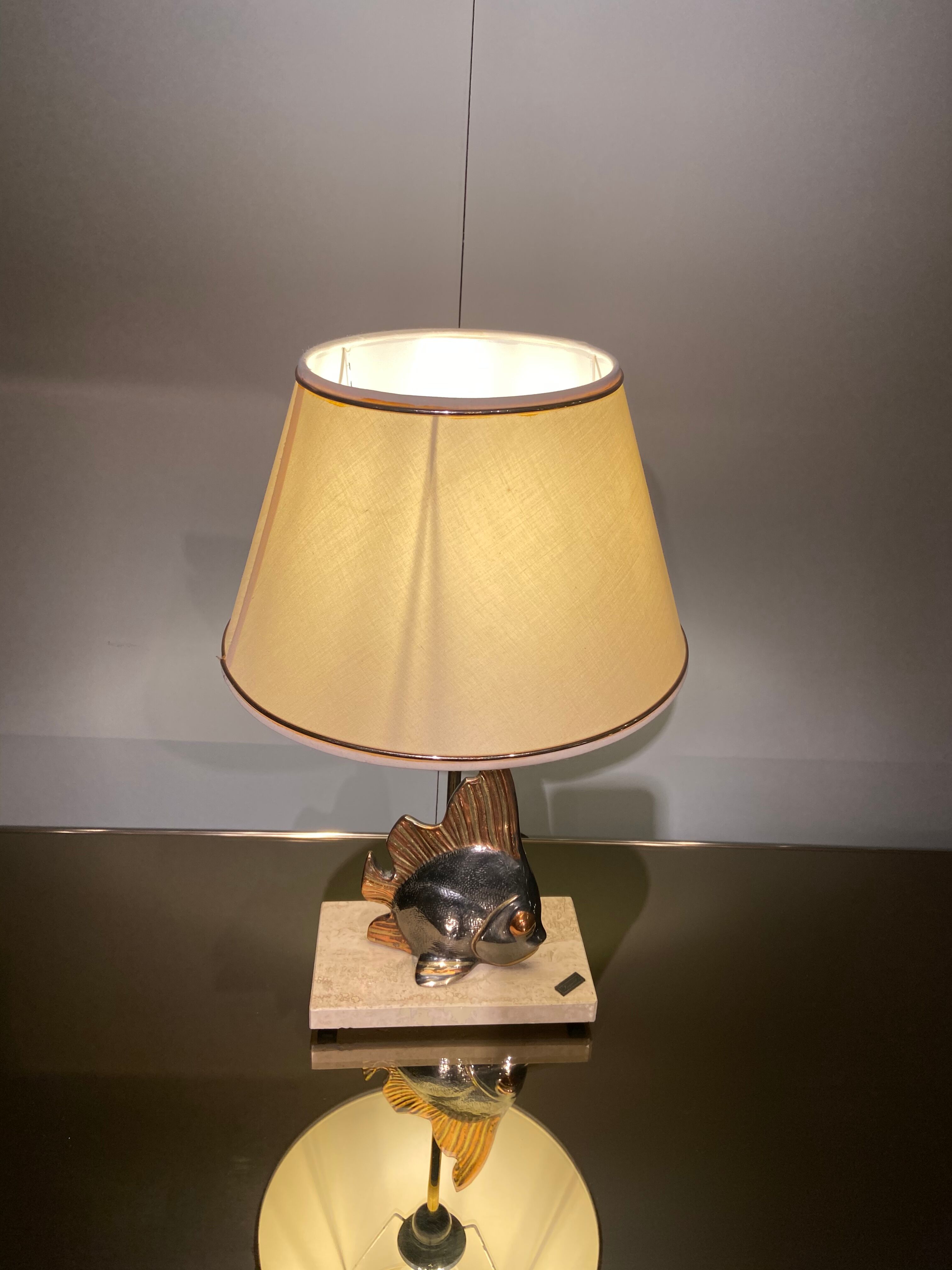 Vintage fish lamp in gold and copper metal