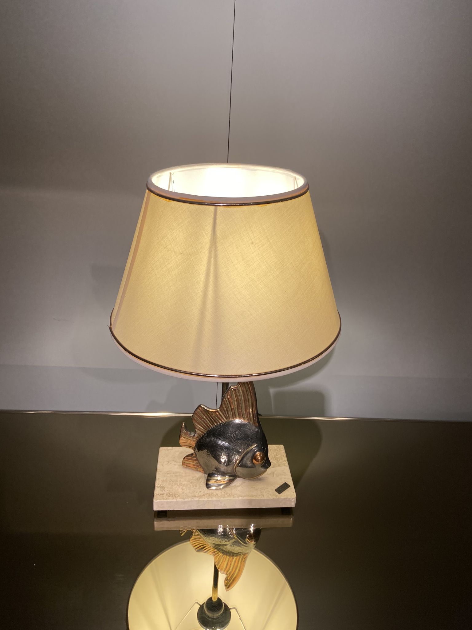 Vintage fish lamp in gold and copper metal