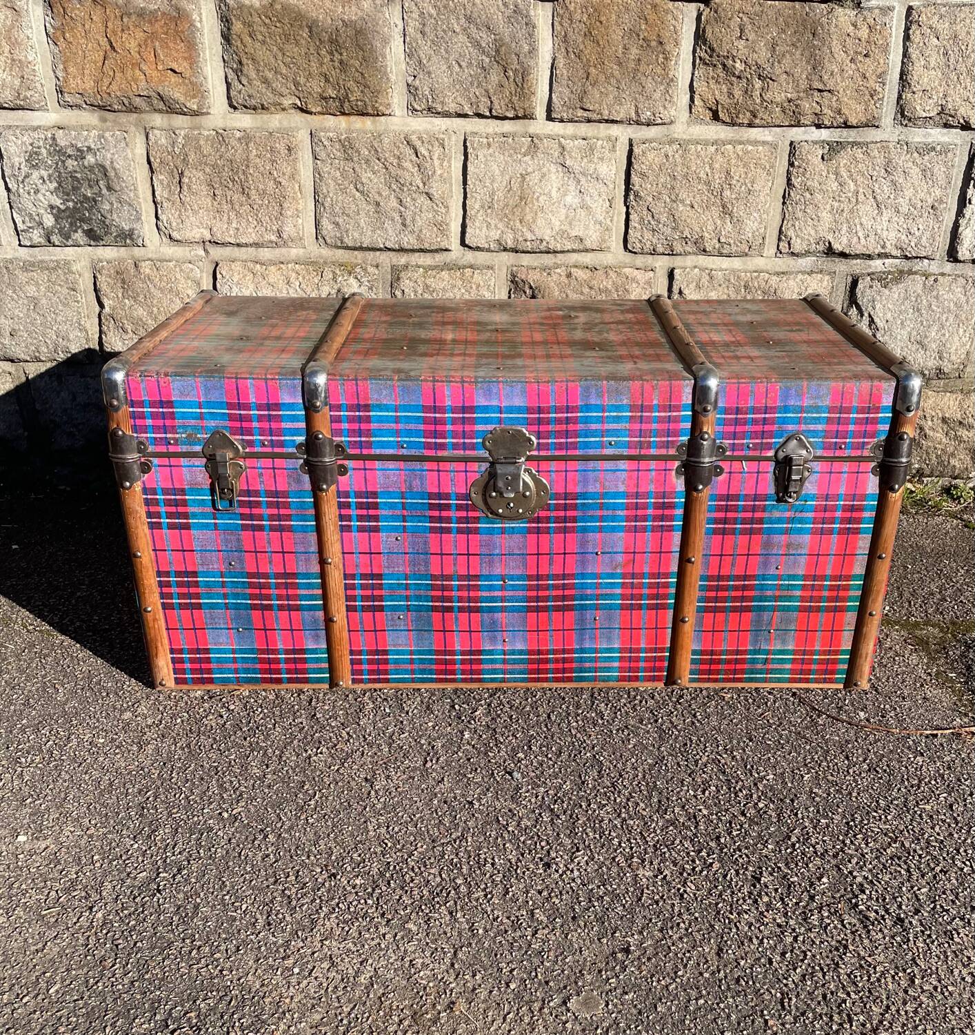 Old wooden and metal travel trunk