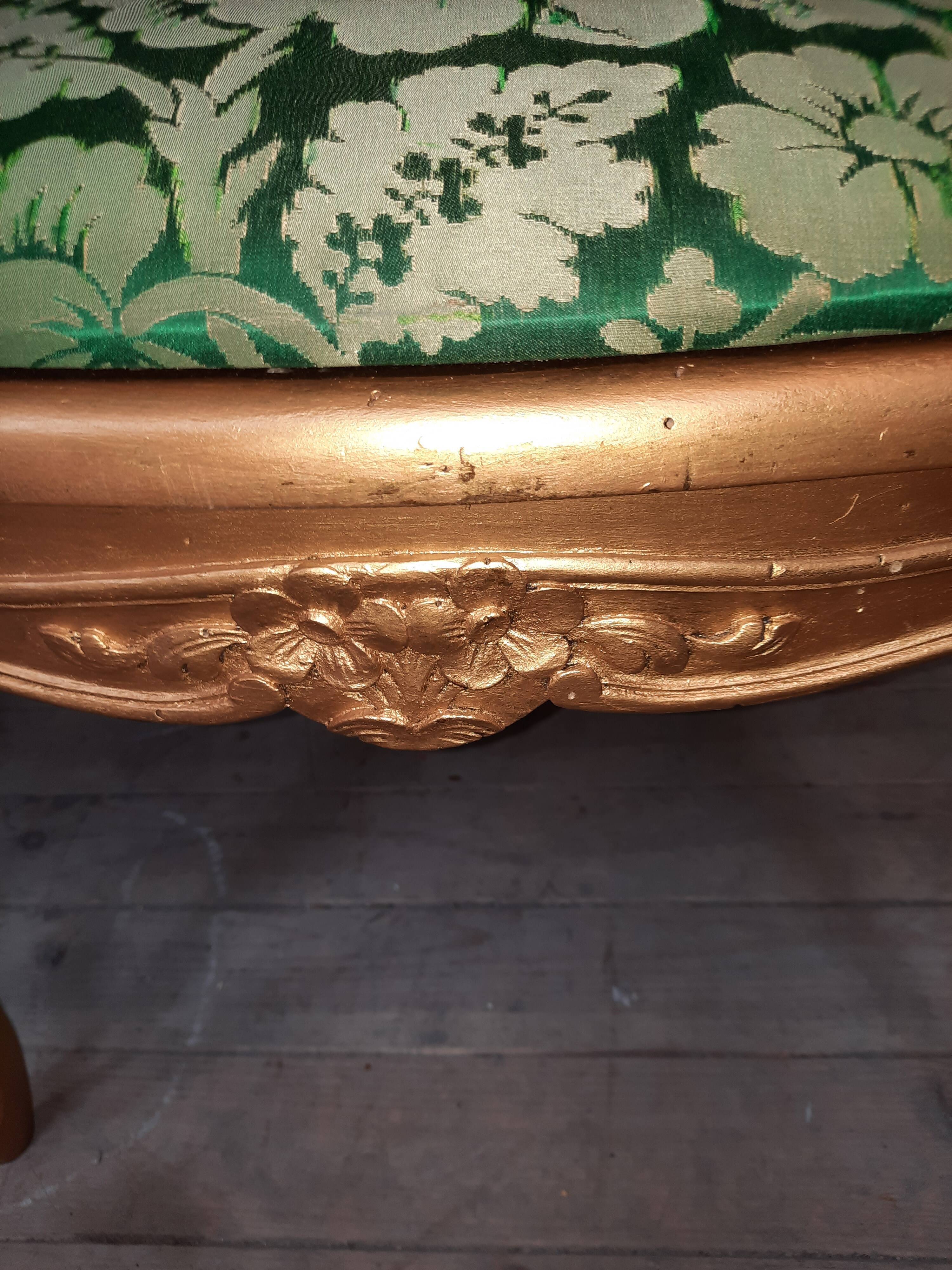 Louis XV-style golden armchair pair