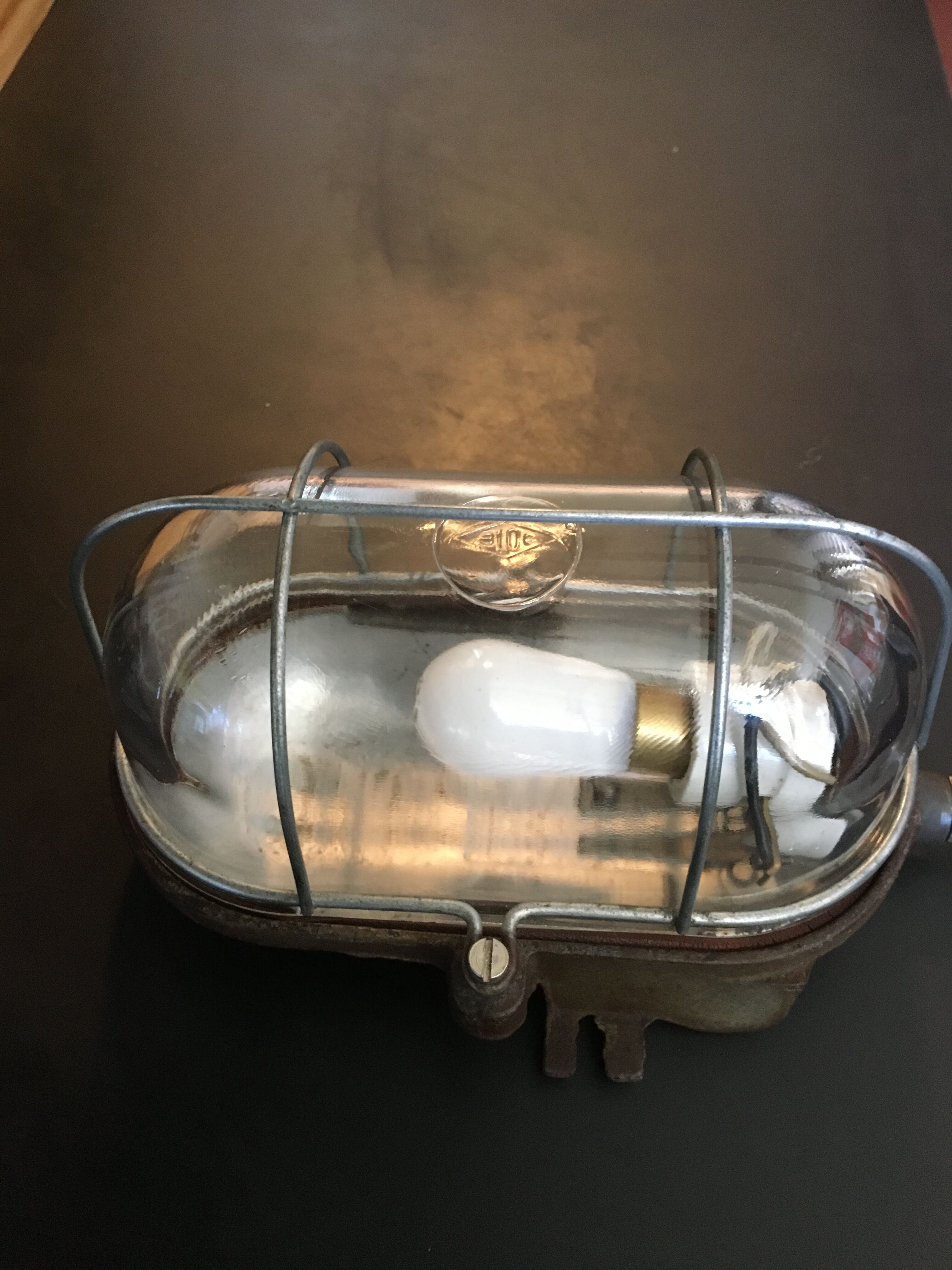 Industrial porthole wall lamp from the 1950s