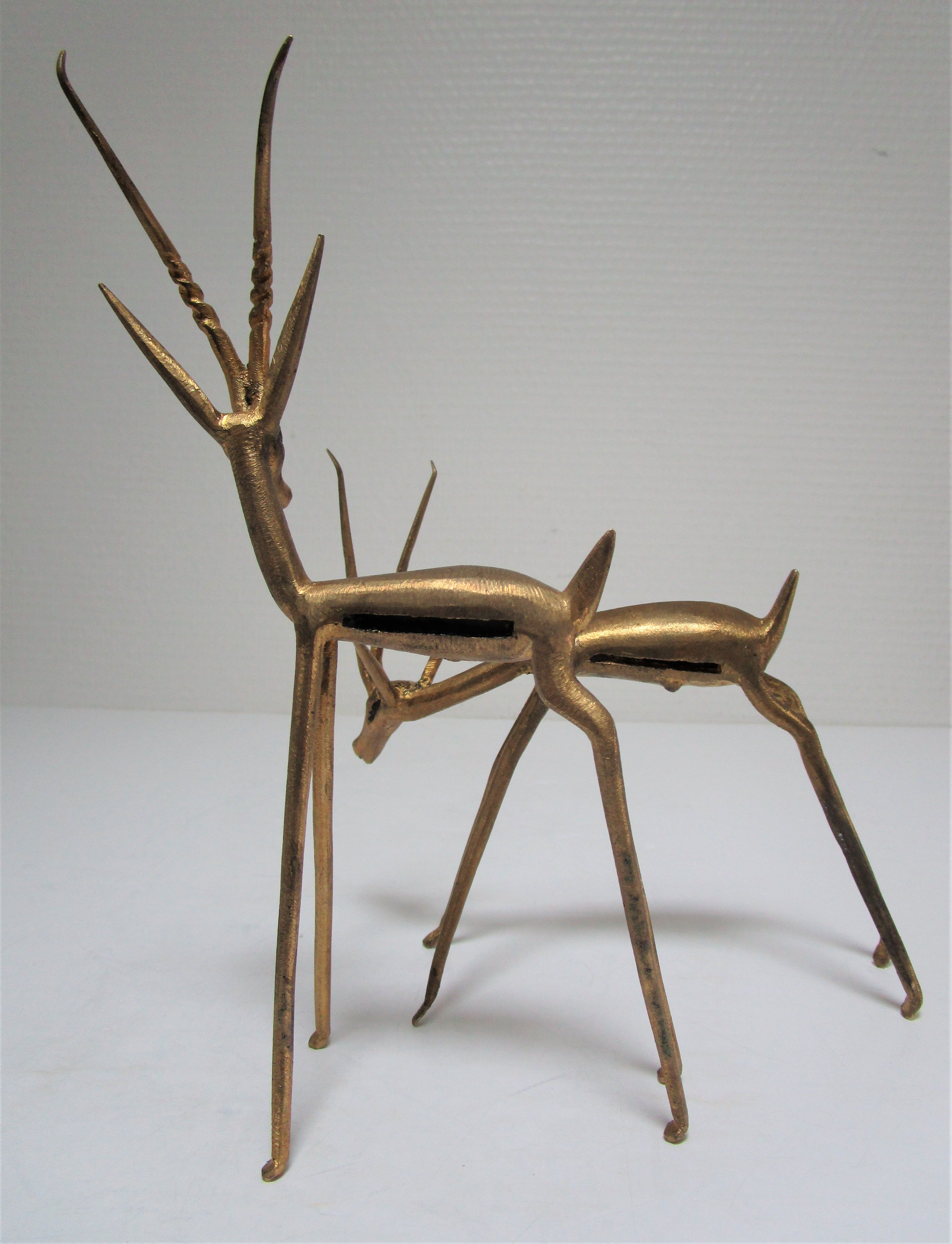 Four vintage brass antelope gazelles