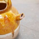 Old gargoulette pot in glazed terracotta