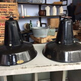 Hanging reflectolux mazda in black enamelled sheet metal.