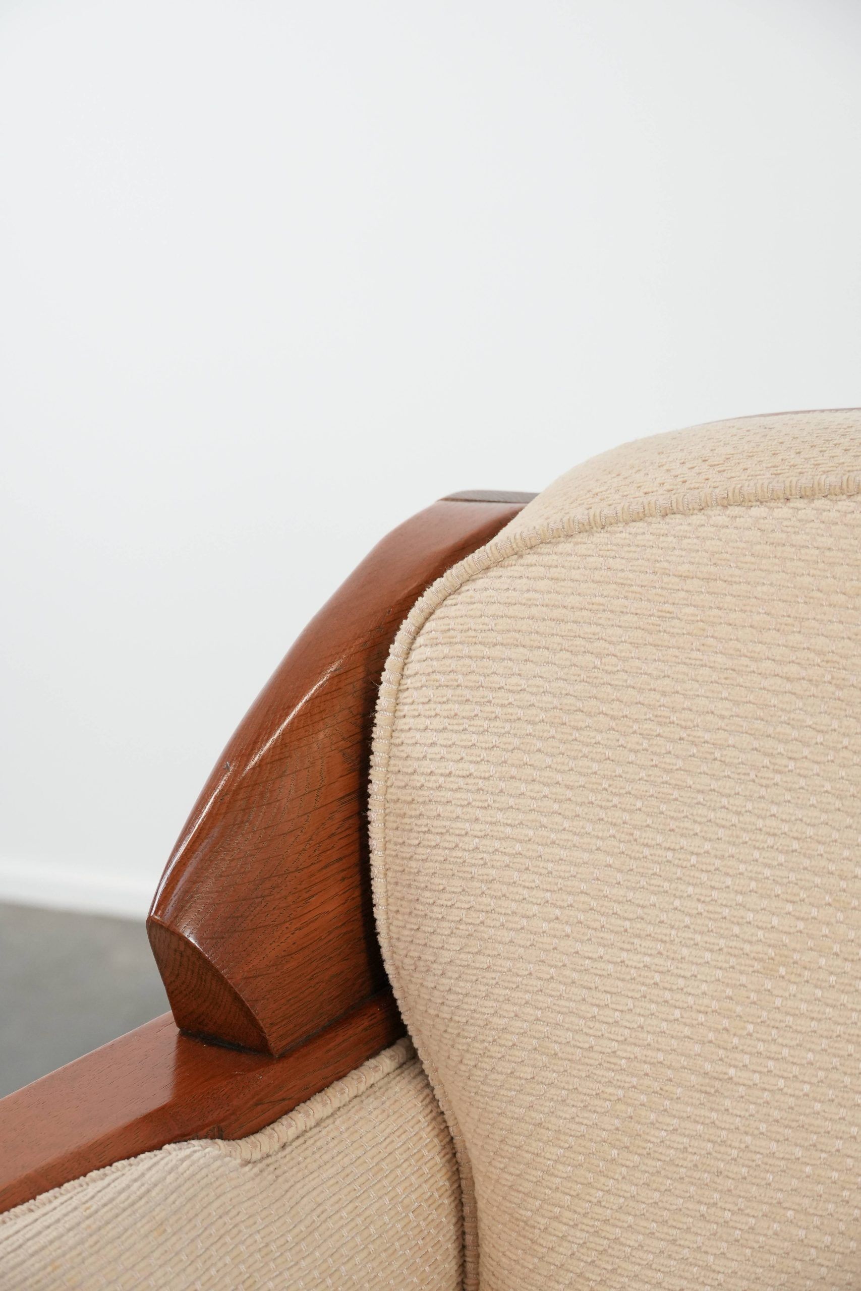 Art Nouveau design armchair with a luxurious light fabric upholstery