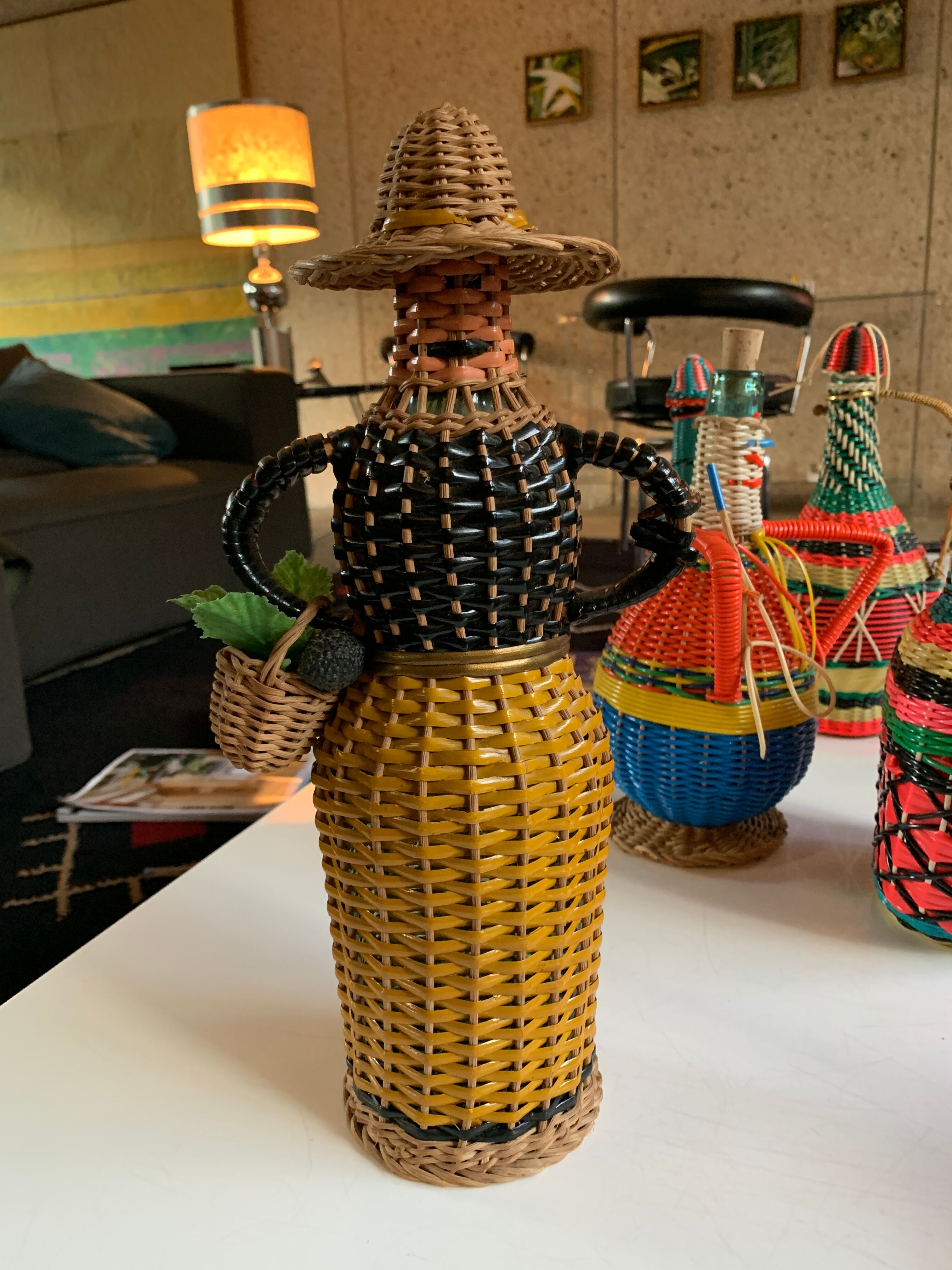 Braided bottle in anthropomorphic wicker