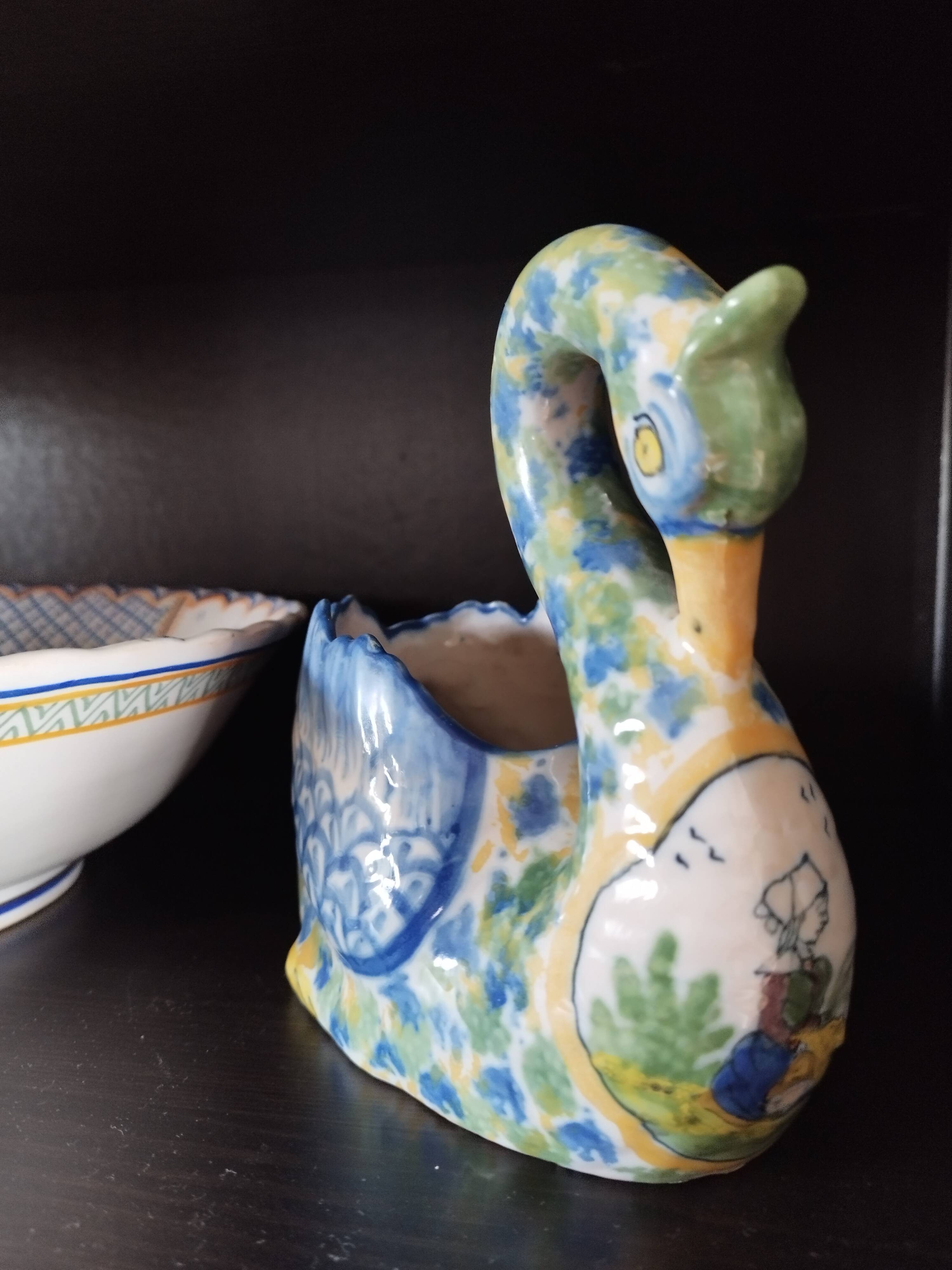 Ashtray or small planter in the shape of a swan made of Quimper earthenware.