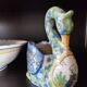 Ashtray or small planter in the shape of a swan made of Quimper earthenware.