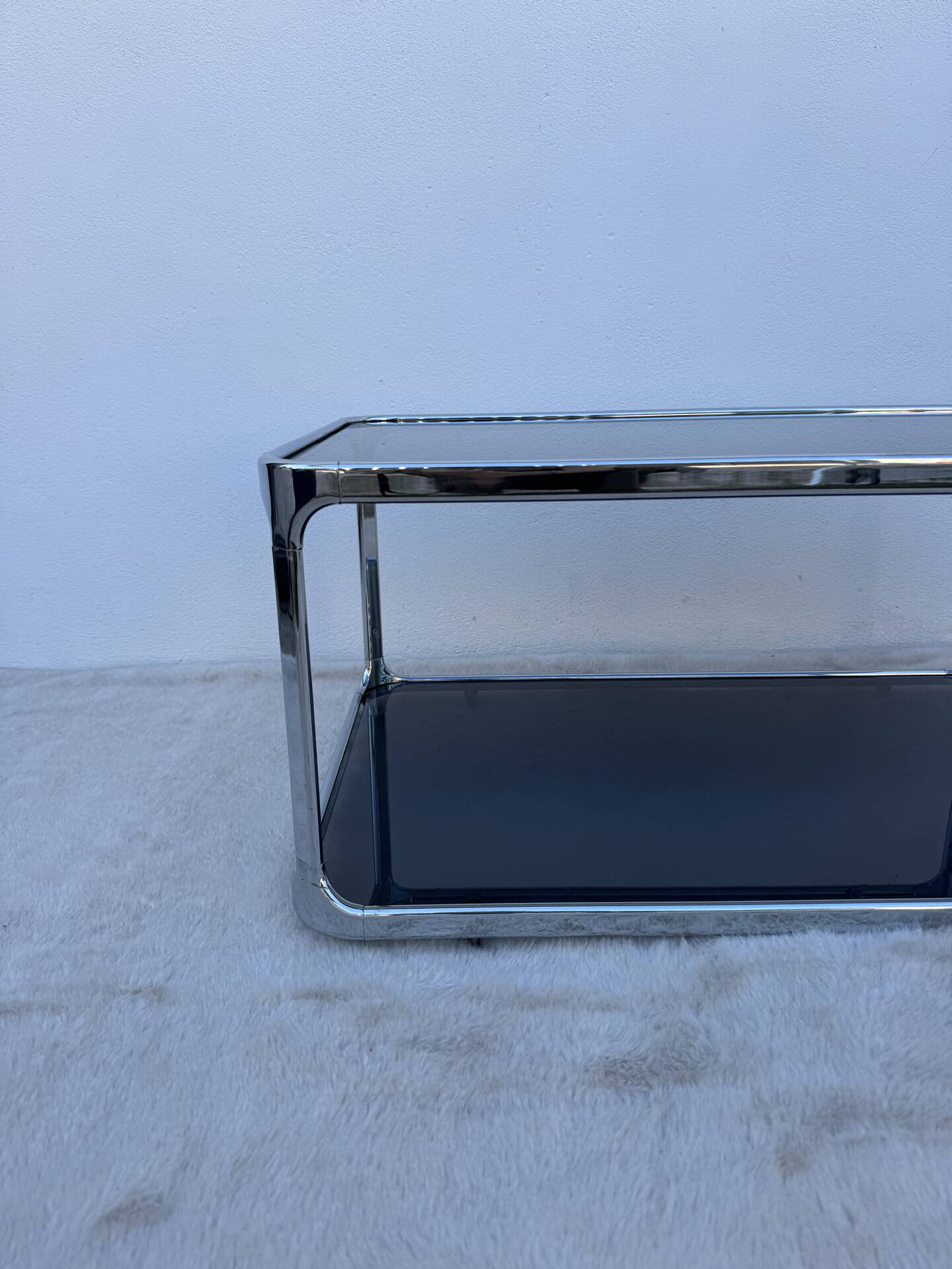 Chrome and smoked glass coffee table from the 1970s.