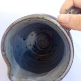 Sarthois pitcher in grey sandstone and rust effect