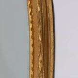 Oval shaped carved gilded Baroque mirror with beveled glass, Belgium