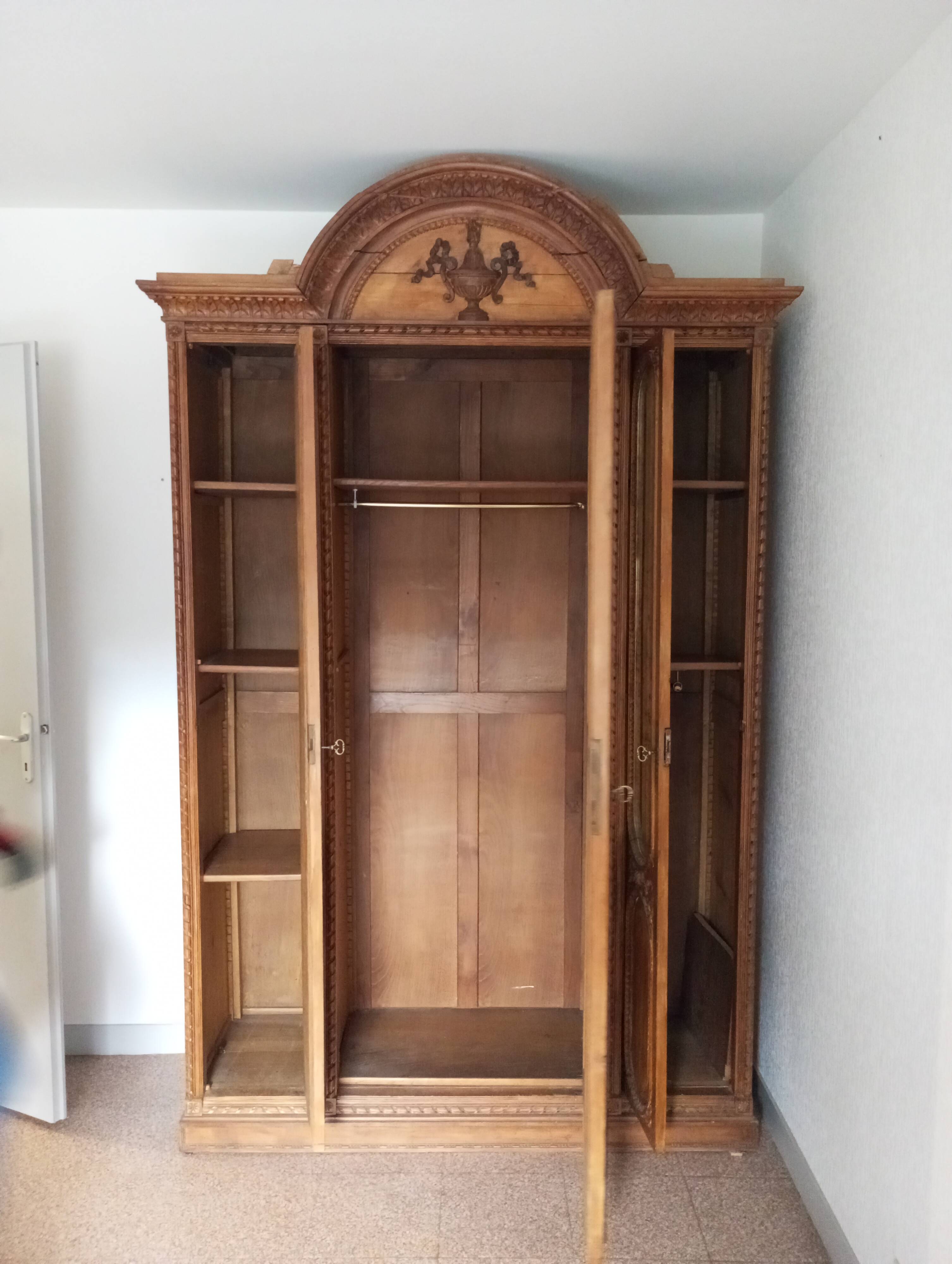 Old and large 3-door wardrobe