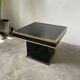 Black lacquer and brass console coffee table