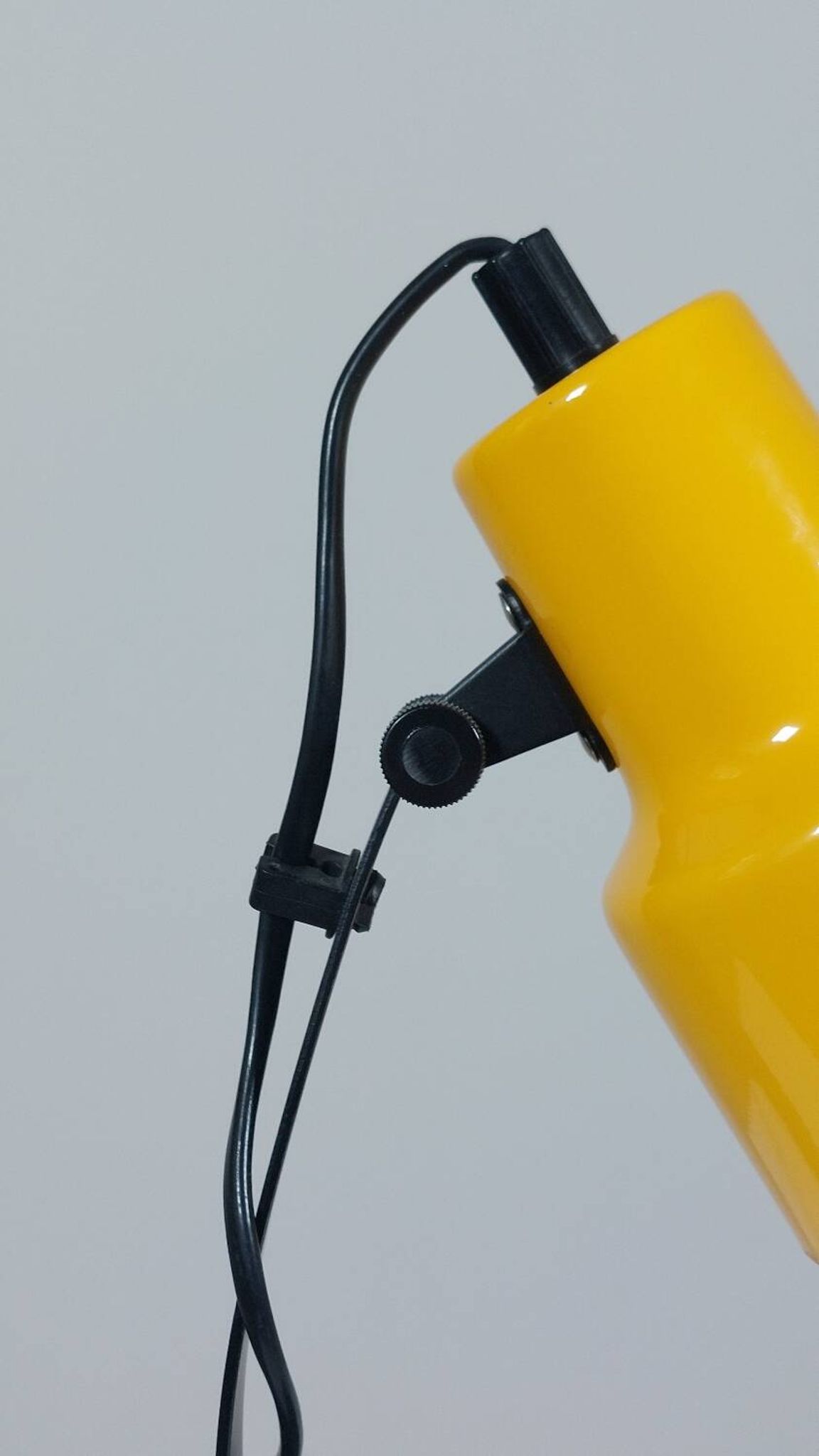 A pair of well-designed minimalist bedside lamps.