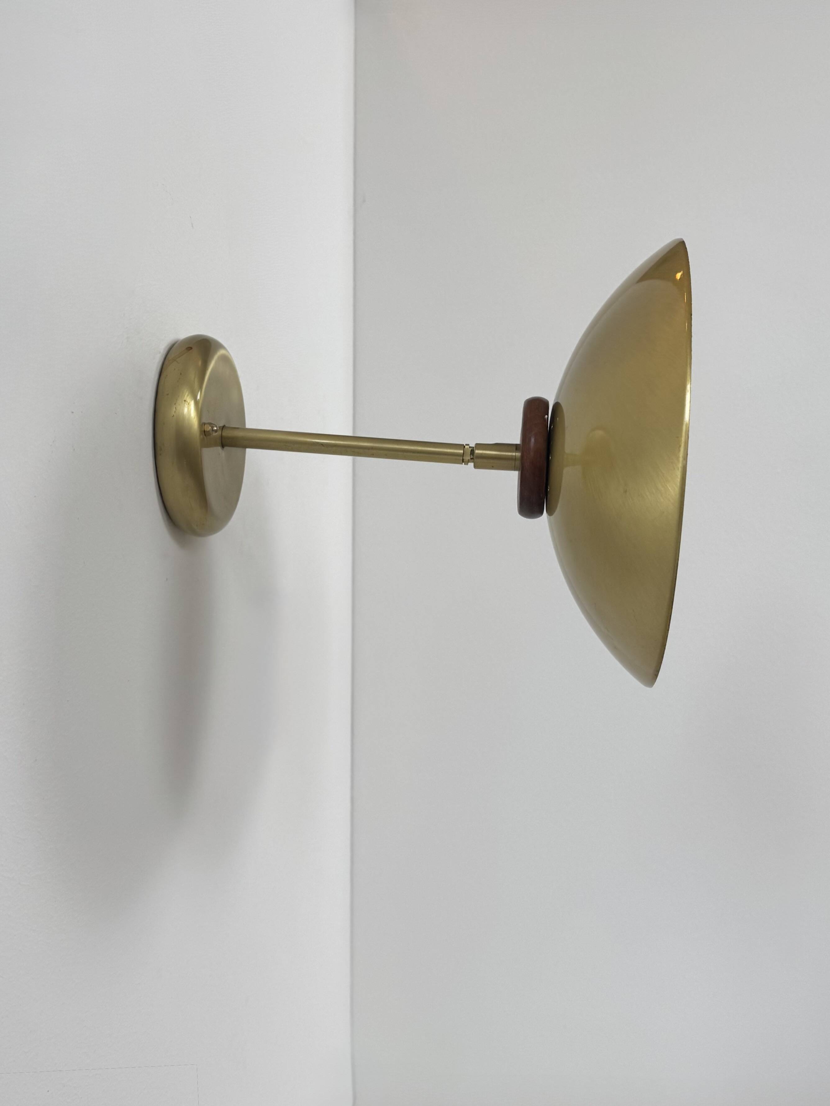 Vintage adjustable wall light, brass and wood, France 1970.