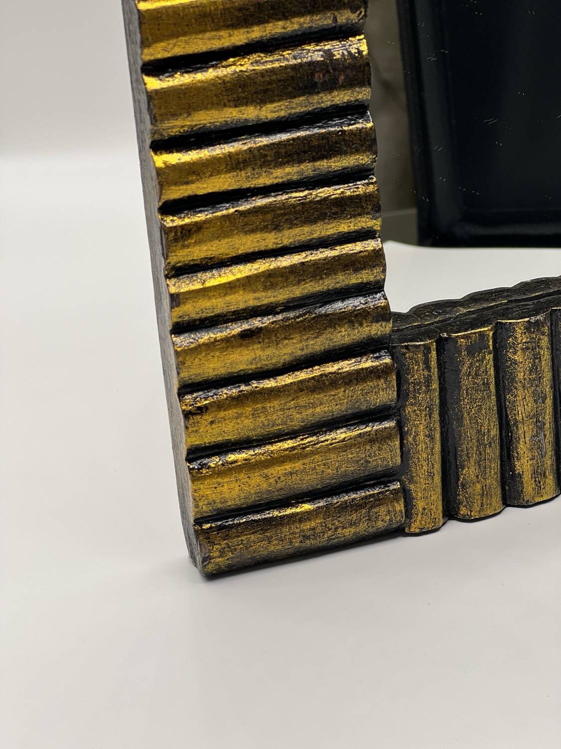 Art deco mirror in gilded wood