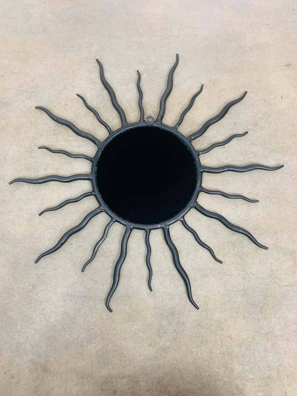 Sun mirror, wrought iron, brutalist design, 1970s.