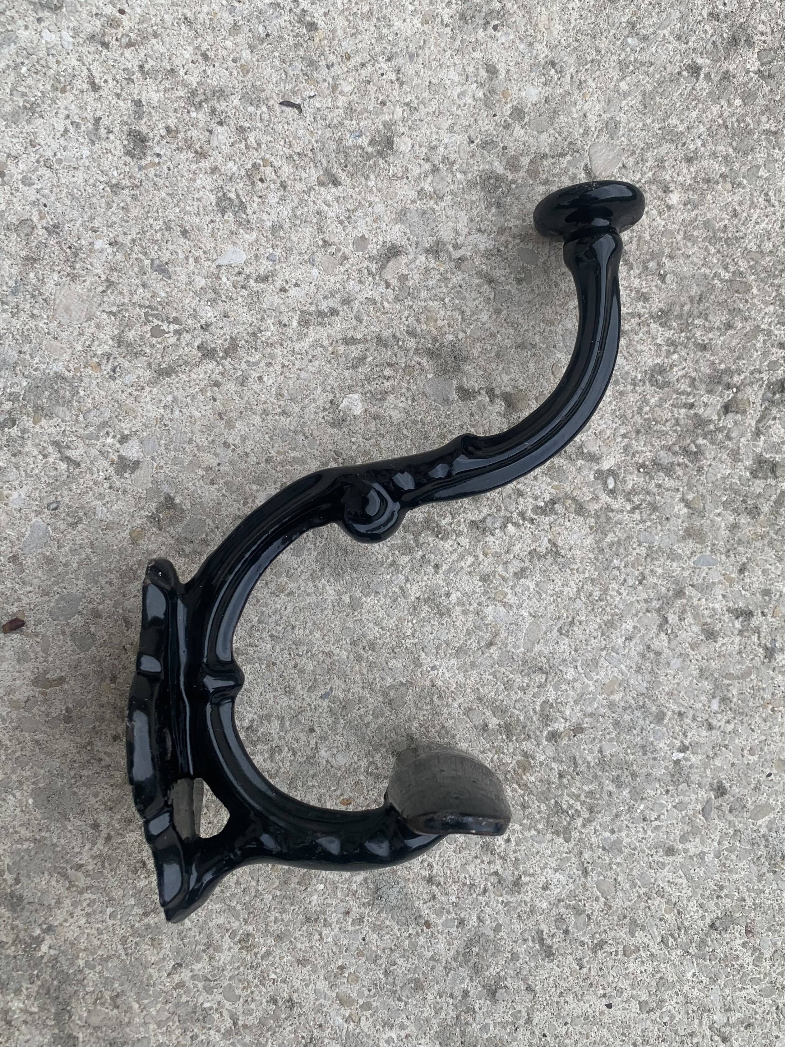 Set of 5 old cast iron hooks