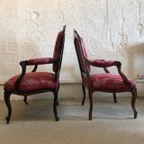 False pair of Louis XV style armchairs, nineteenth century