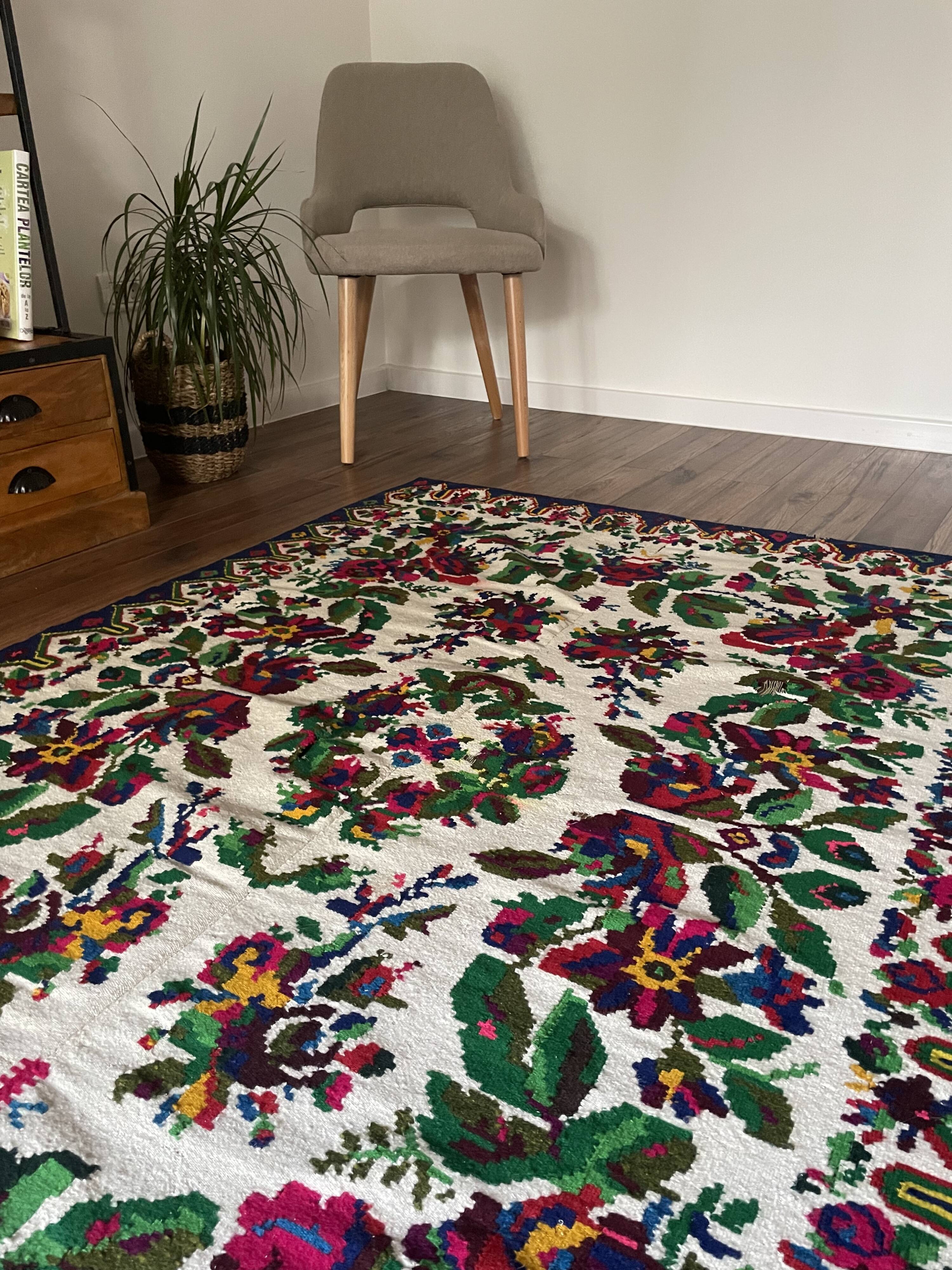 White vintage floral rug made by hand in Romania, beautiful flowers