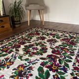 White vintage floral rug made by hand in Romania, beautiful flowers