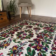 White vintage floral rug made by hand in Romania, beautiful flowers