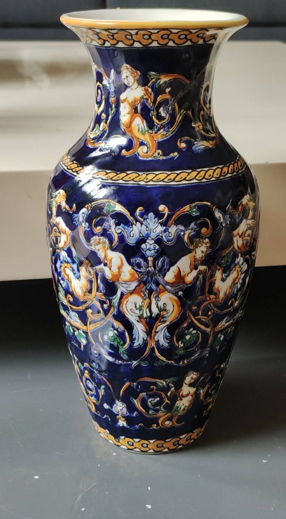 Twisted design vase. Signed Gien France/Renaissance blue background 26 x 13cm