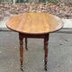 Oval extendable table with leaves Louis Philippe in solid wood, 19th century, with drawer.