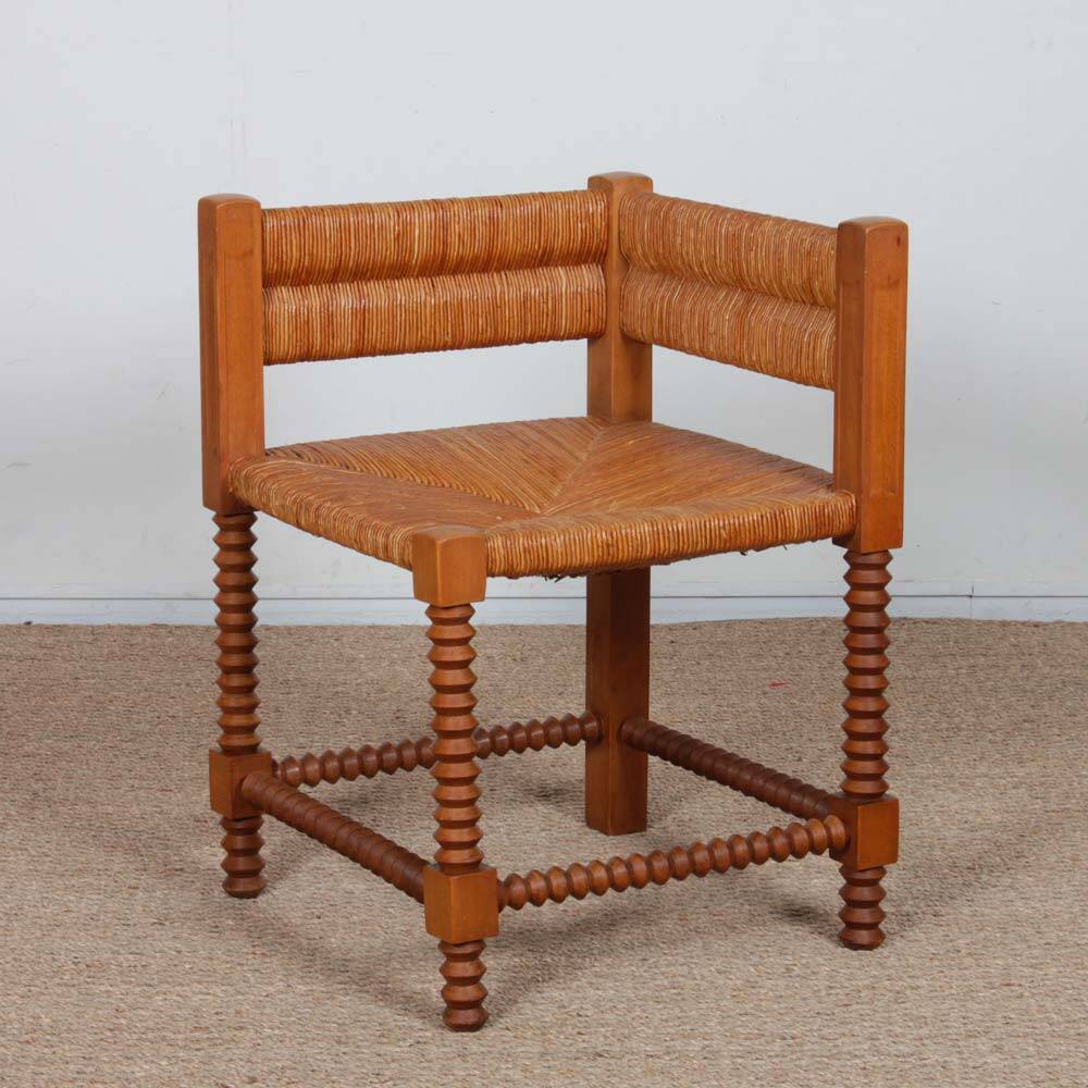 Pair of turned wooden corner chairs with rush seats, 1940.
