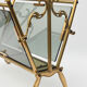 Brass and glass magazine holders
