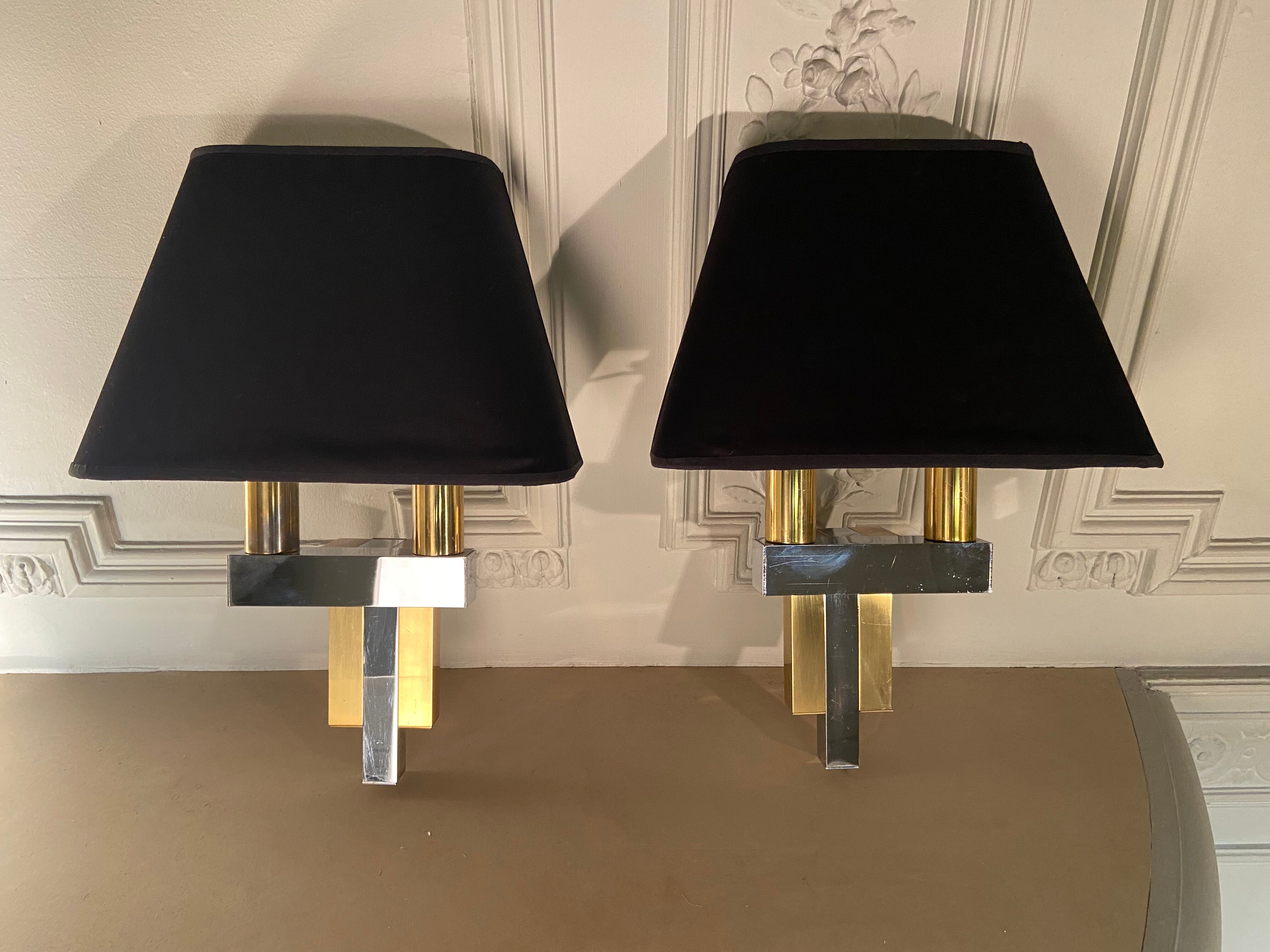 Pair of brass and chrome sconces