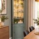 Corner display cabinet in bronze green