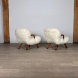 Early pair of arnold madsen clam chairs in curly sheepskin, madsen & schubell, 1944