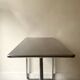 Dining table / tubular and modernist desk in chrome metal