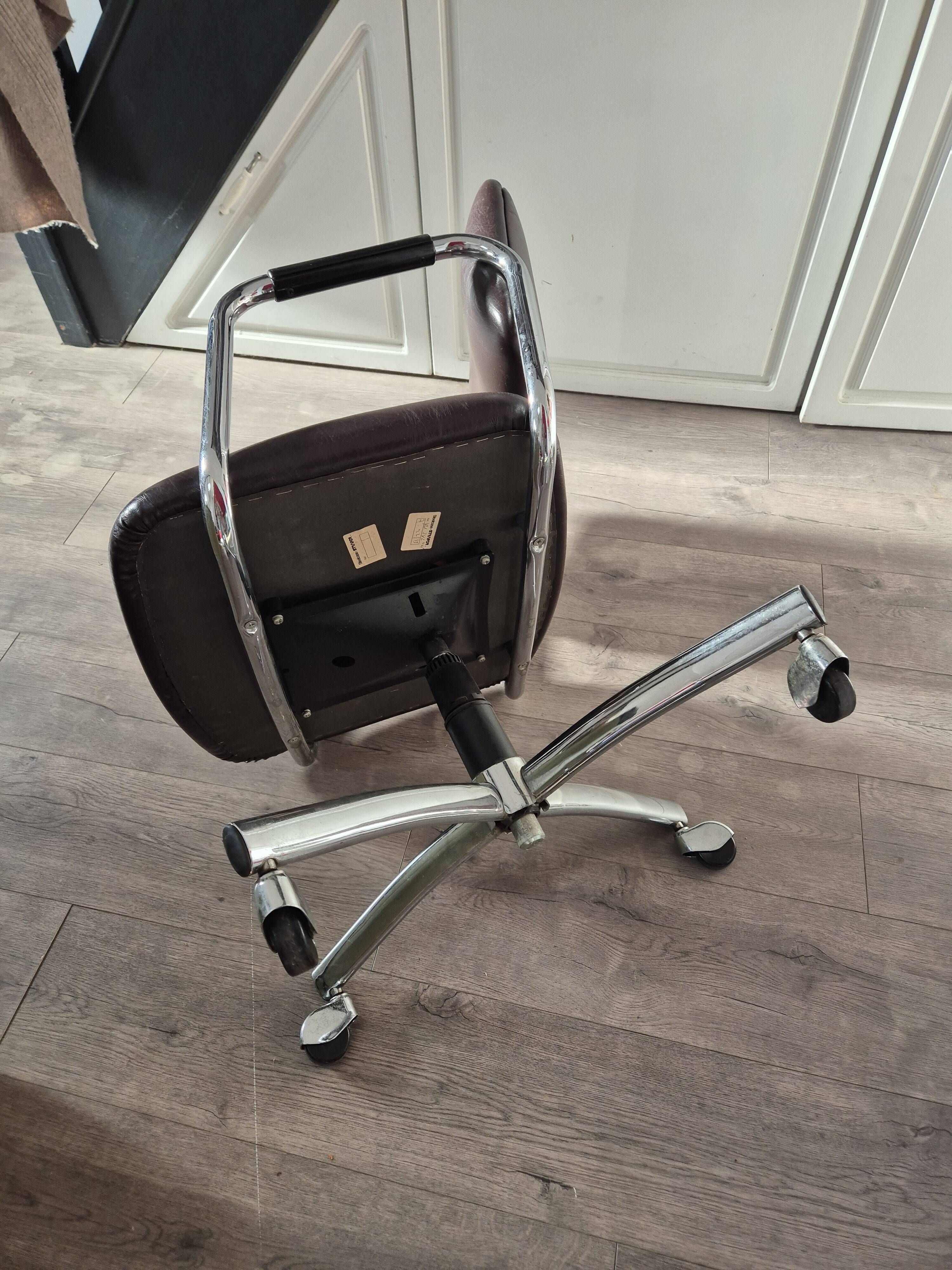 Vintage strafor brown leather armchair with casters